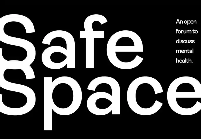 Image of a black poster with white text, for the Safe Space podcast, with the words "An open forum to discuss mental health."