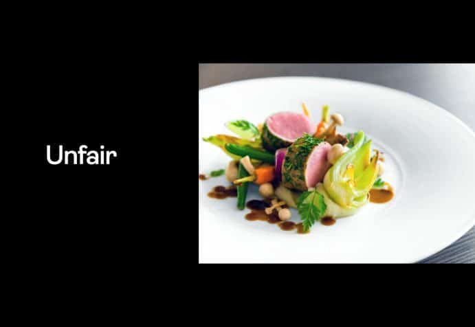 Image with the word "unfair" next to a Michelin Star plate of food.