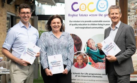 Photo of Roadmap MBA Founder Steve Pugh with Coco charity CEO Lucy and Olympian Steve Cram holding copies of the Roadmap MBA book