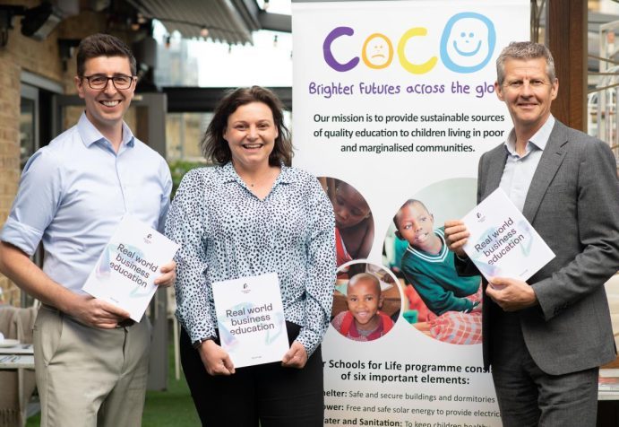 Photo of Roadmap MBA Founder Steve Pugh with Coco charity CEO Lucy and Olympian Steve Cram holding copies of the Roadmap MBA book