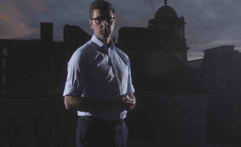 Roadmap MBA founder Steve Pugh stood on a city skyline with dramatic lighting